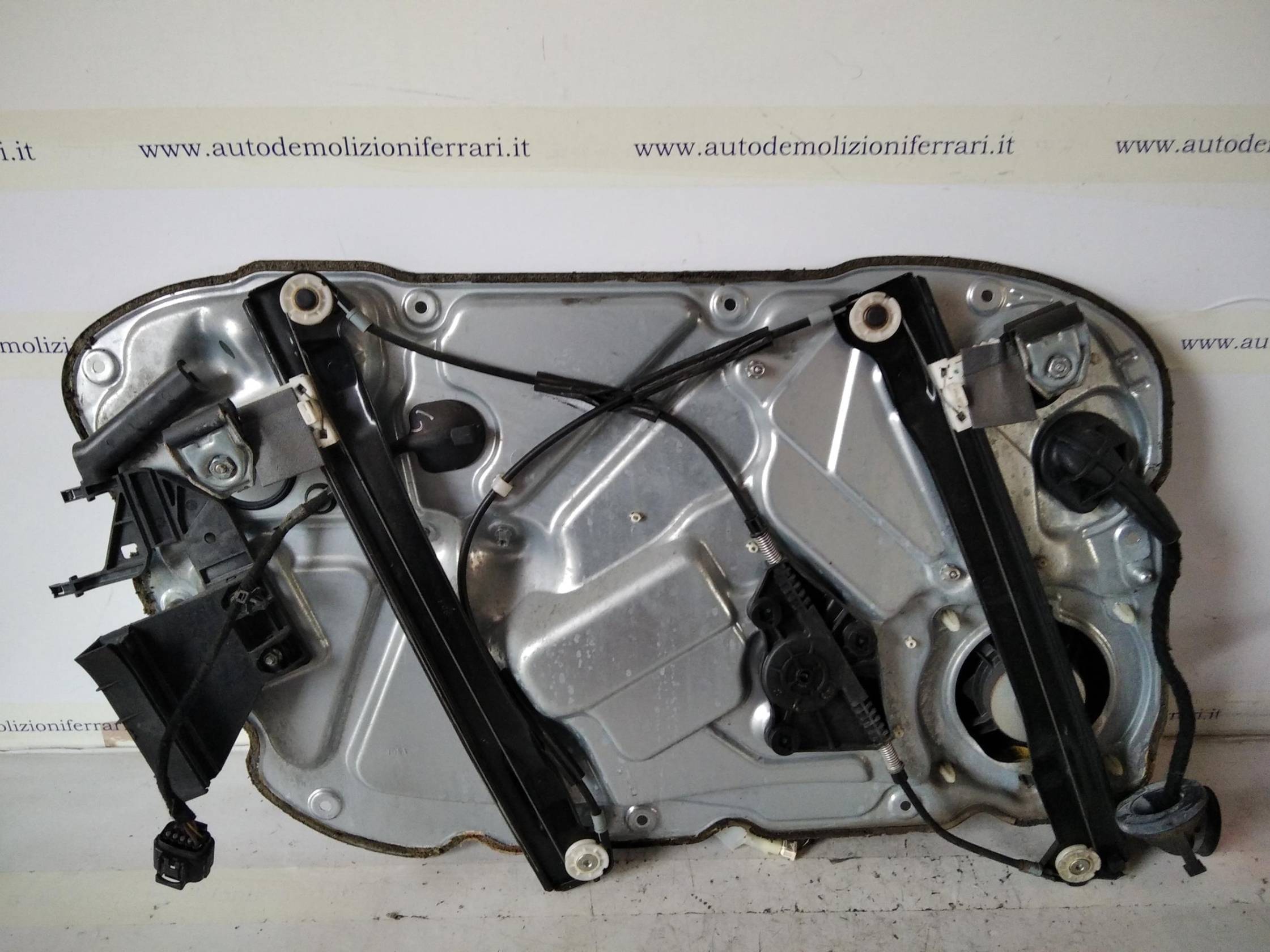 Alzacristallo elettr. porta ant. dx.